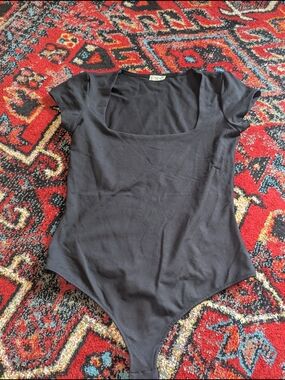 Free People Black Scoop Neck Short Sleeve Bodysuit